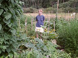 Master Gardener Program Manager Susannah Reese at the lush Owego garden.